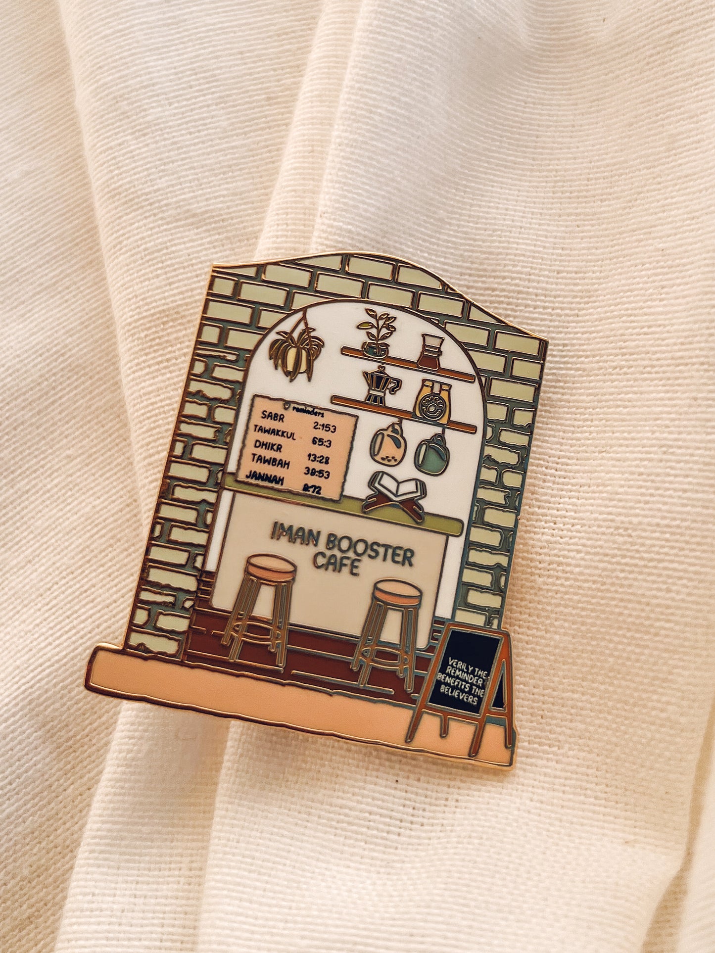 Iman Booster Booth Enamel Pin
