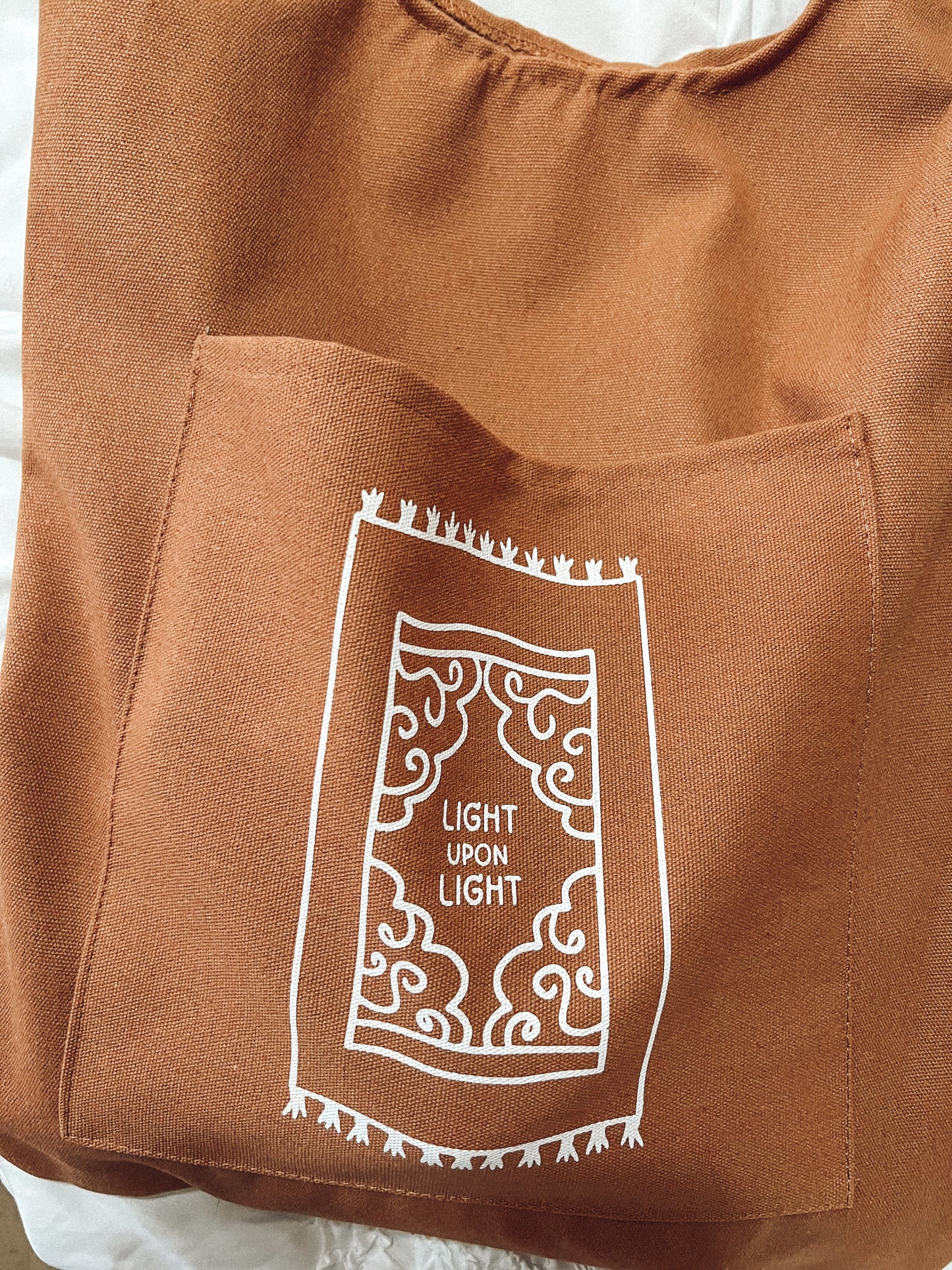 Light Upon Light Tote Bag